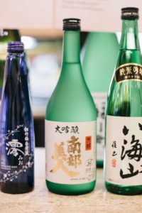 Bottles of sake on display